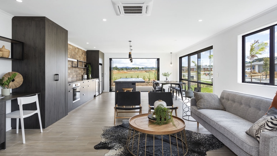 Open plan kitchen living and dining area in the Classic Builders Whangarei Showhome