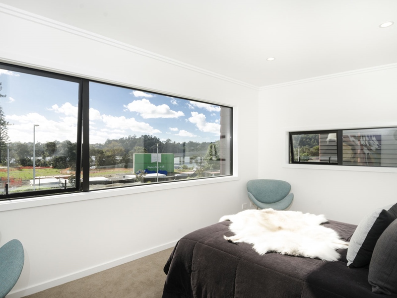 Upstairs bedroom with view Classic Builders Showhome Hobsonville Point