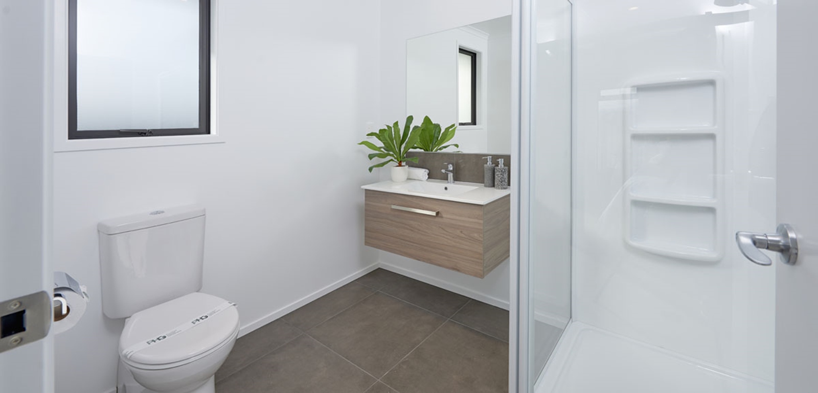 Modern bathroom design in Classic Builders Omokoroa Showhome