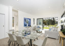 Dining and living area in the Classic Builders Showhome at Hobsonville Point