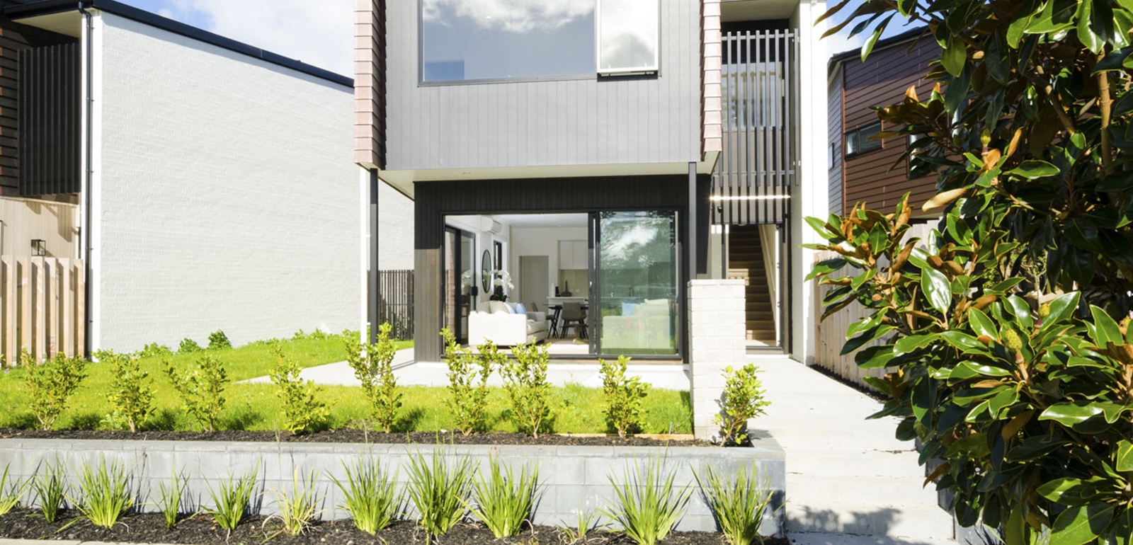 Walkway past Classic Builders Showhome at Hobsonville Point