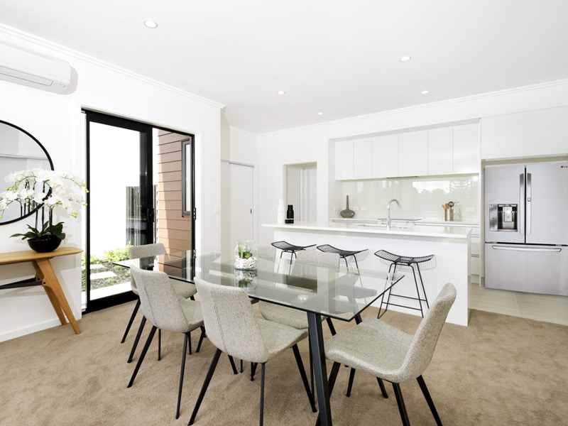 Kitchen and dining area in the Classic Builders Hobsonville Point Showhome