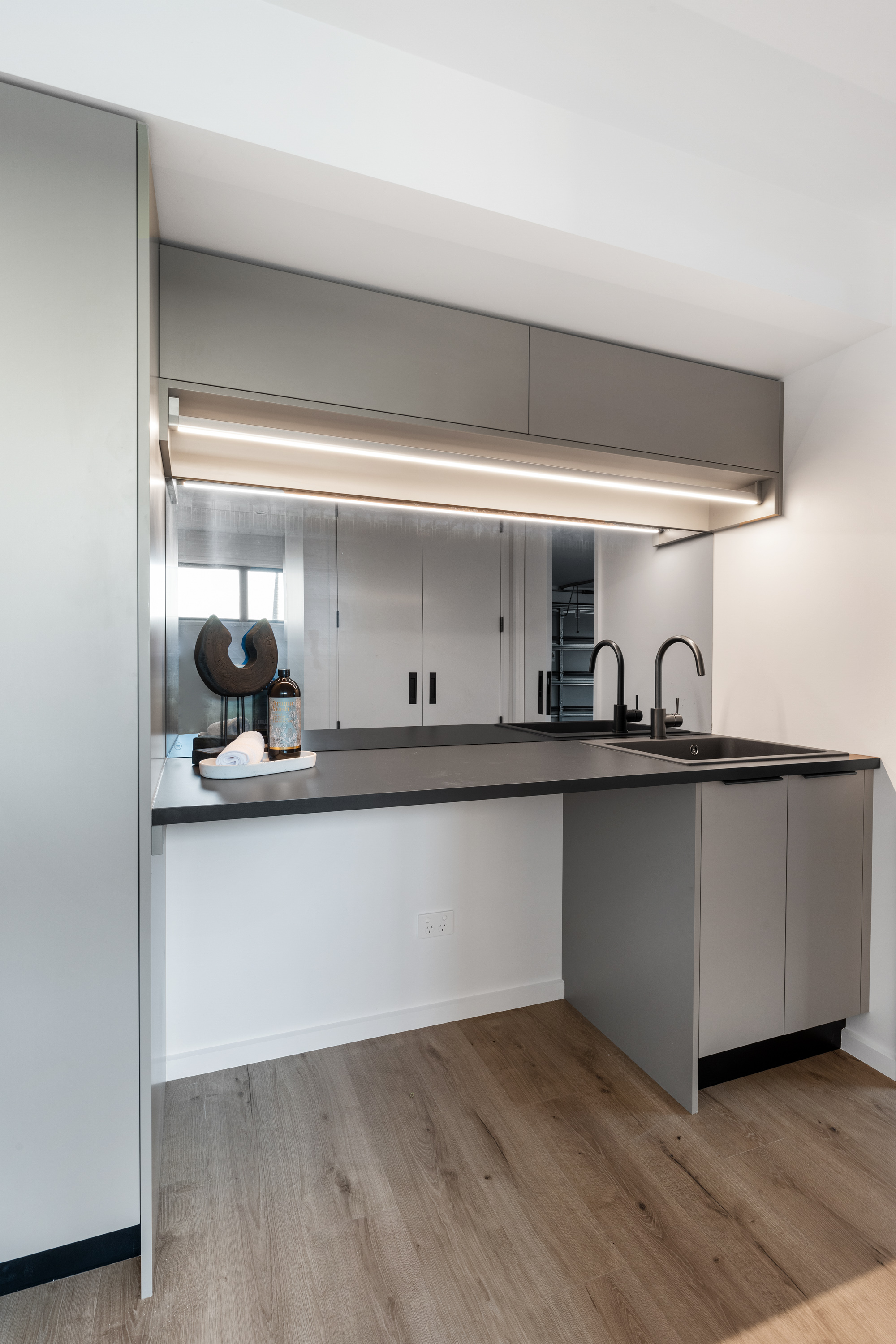 Modern laundry room with sink | Classic Builders