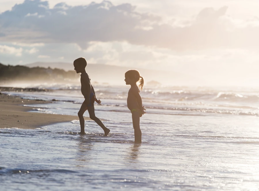 kids playing on beach Hunua Views